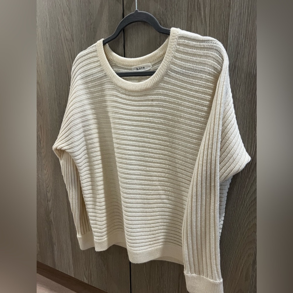 cream sweater